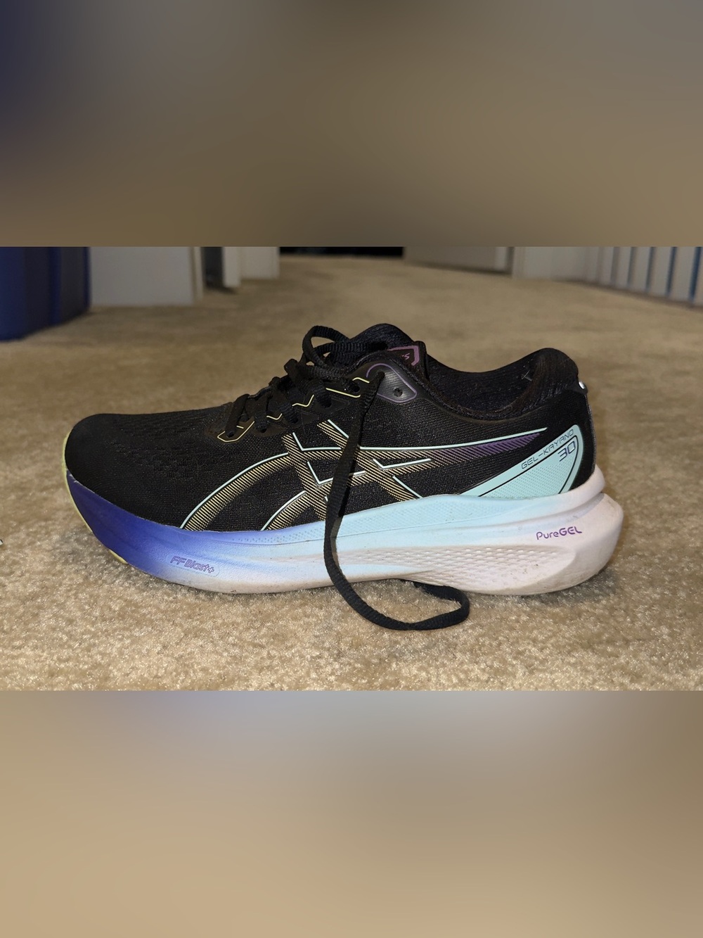 Asics Women’s Black Running Shoes with Purple and Yellow Accents